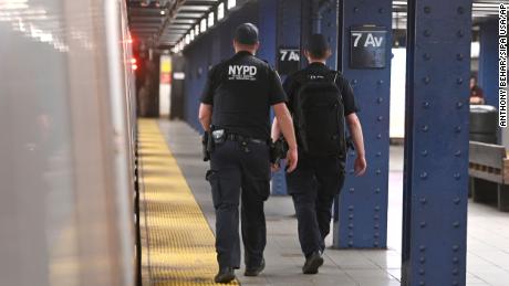 Two NYPD Transit Bureau Anti Terrorist Unit officers seen on Seventh Avenue Subway platform, New York, NY, May 24, 2022.