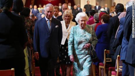 Britain&#39;s Queen Elizabeth II and Britain&#39;s Prince Charles, Prince of Wales arrive for the formal opening of the Commonwealth Heads of Government Meeting (CHOGM) at Buckingham Palace in London on April 19, 2018. - Britain&#39;s Queen Elizabeth II, the Head of the Commonwealth, opened the Commonwealth summit for what may be the last time on April 19, 2018, voicing hope that her son would be allowed to carry on her role.