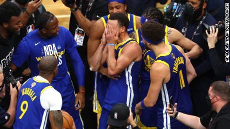 Stephen Curry celebrates with teammates after defeating the Boston Celtics in Game 6.