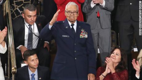 Charles McGee, who served with the Tuskagee Airmen, salutes during the State of the Union address on February 4, 2020, at President Donald Trump&#39;s State of the Union Address.