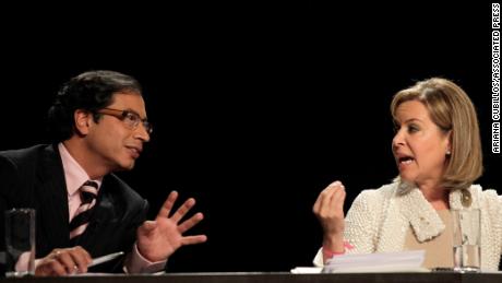 Petro, left, and Noemi Sanin, of the Conservative Party, gesture as they take part in a televised presidential debate in Bogota in May 2010. 