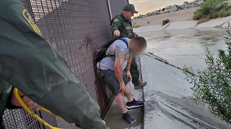 Migrant rescues along US-Mexico border climb amid sweltering heat and high water levels