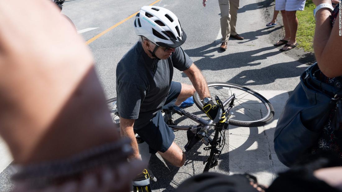 Biden is ‘fine’ after falling off his bike in Delaware White House says – CNN