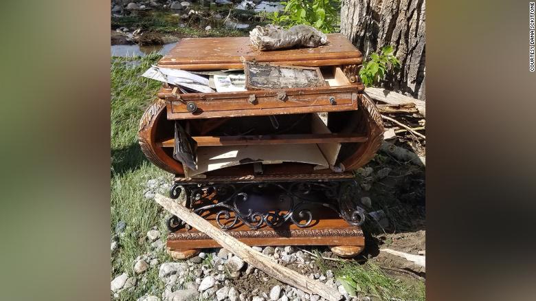 Montana couple reunited with old family photos after floodwaters sent their furniture floating down the street