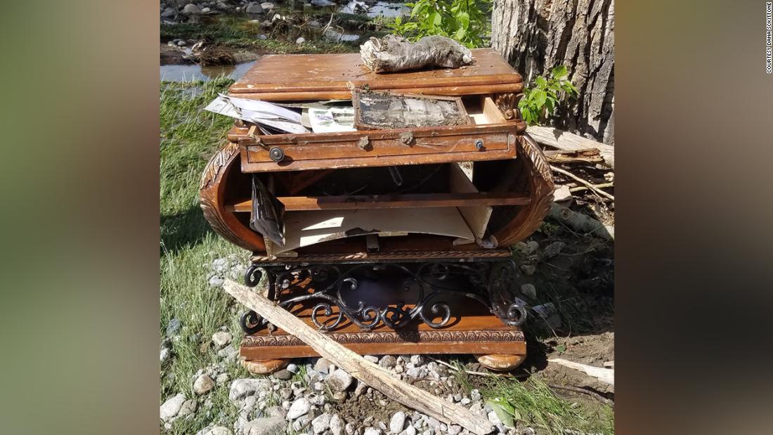 Montana couple reunited with old family photos after floodwaters sent their furniture floating down the street