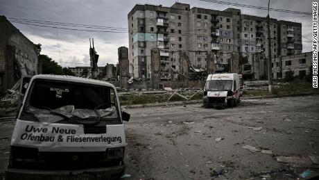 Destroyed vehicles are pictured in the city of Lysychansk in the eastern Ukrainian region of Donbas on June 18, 2022. 