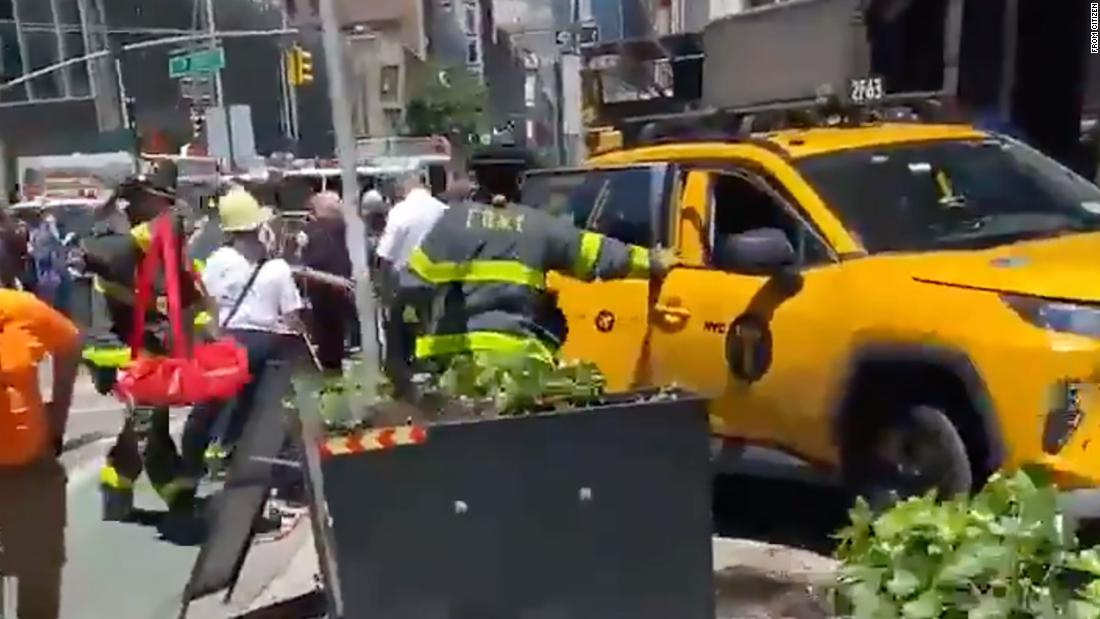 4 people struck by a taxi that jumped the curb in New York City, NYPD says