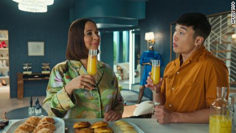 (From left to right) Maya Rudolph and Joel Kim Booster are shown in a scene from "loot."