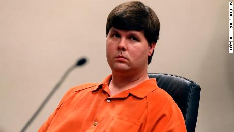 Justin Ross Harris, who prosecutors said intentionally left his 22-month-old son strapped inside a hot car to die because he wanted to live a child-free life, sits in Cobb County Magistrate Court in Marietta, Georgia, U.S. on July 3, 2014.