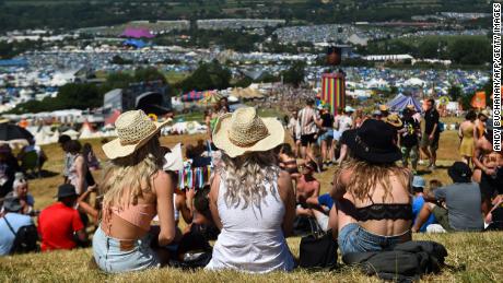 Glastonbury festival-goers enjoy the sunshine and warm weather on Wednesday.