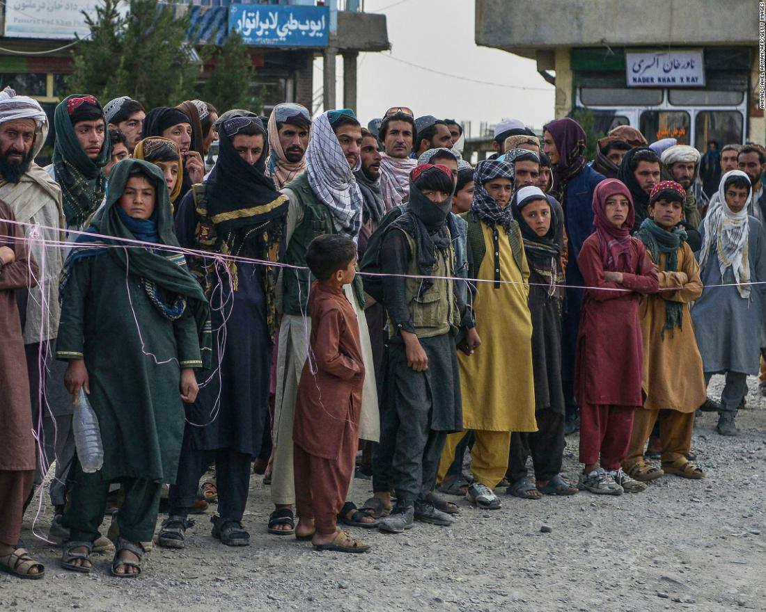 People queue up in a line to donate blood for the earthquake victims being treated at a hospital in Paktika, Afghanistan, on June 22.