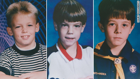 Yearbook photos of Steve Branch, Chris Byers and Michael Moore presented as state's evidence. 