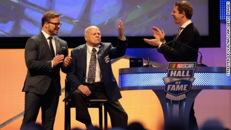 Bruton Smith (center), seen in 2016 with son Marcus Smith (left) and NASCAR driver Brad Keselowski, has died at the age of 95, according to one of the companies he founded.