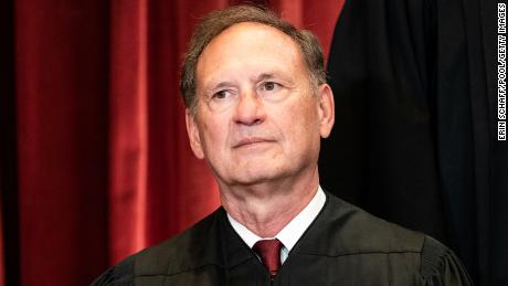 Associate Justice Samuel Alito sits during a group photo of the Justices at the Supreme Court in Washington, DC, on April 23, 2021.