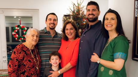 PJ Rodriguez and wife Vivian Lasaga, right, pose for a photo with Rodriguez&#39;s late grandmother Elena Chavez, brother Alex Rodriguez, son John Rodriguez and late mother Elena Chavez Blasser.