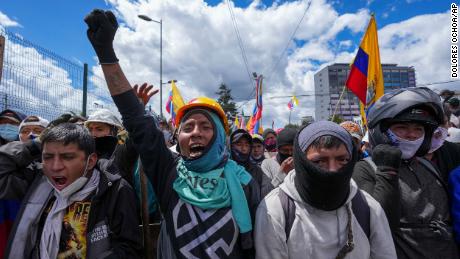 Protesters march against President Guillermo Lasso's economic policies and demand a reduction in fuel prices in downtown Quito, Ecuador on Thursday, June 23, 2022. 