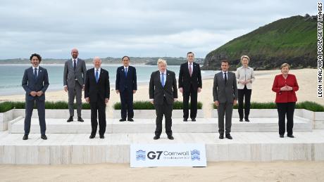 G7 leaders pose for the official welcome and family photo during the UK-hosted G7 Summit in Cornwall&#39;s Carbis Bay in June last year.