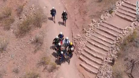 Hikers were rescued from an Arizona mountain while filming a reality show as temperatures hit 108 degrees