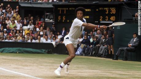 Arthur Ashe plays in the men's singles competition at Wimbledon.