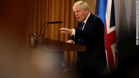 Britain&#39;s Prime Minister Boris Johnson gestures as he addresses a press conference during the Commonwealth Heads of Government Meeting (CHOGM) at Lemigo Hotel in Kigali on June 24, 2022. - Leaders of Commonwealth countries meet every two years for the Commonwealth Heads of Government Meeting (CHOGM), hosted by different member countries on a rotating basis. Since 1971, a total of 24 meetings have been held, with the most recent being in the UK in 2018. (Photo by Dan Kitwood / POOL / AFP) (Photo by DAN KITWOOD/POOL/AFP via Getty Images)