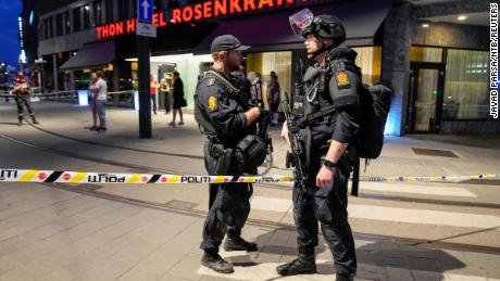 Security forces at the site of a shooting outside the London Pub in central Oslo, Norway, on June 25.