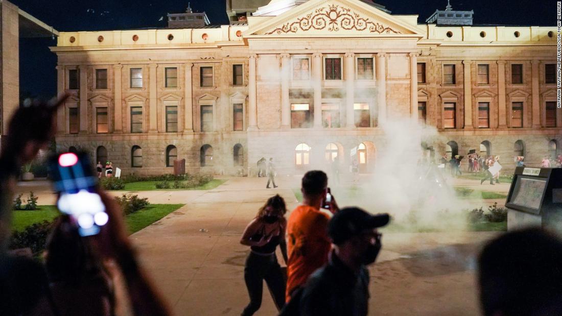 Tear gas used to disperse protestors outside Arizona Capitol building officials say – CNN