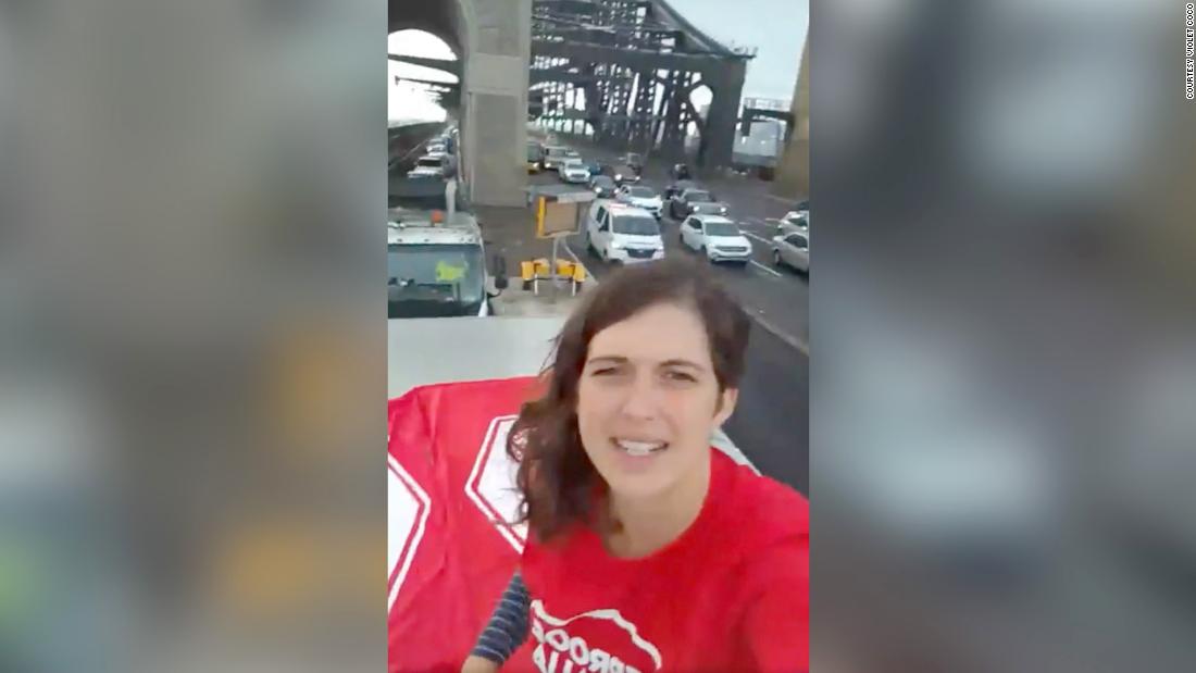 Violet Coco livestreamed her message from the top of a truck blocking one lane of traffic on Sydney Harbour Bridge in April, 2022. 