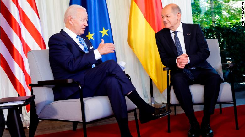 German Chancellor Olaf Scholz, right, welcomes US President Joe Biden, left, for a bilateral meeting at Castle Elmau in Kruen, near Garmisch-Partenkirchen, Germany, on Sunday, June 26, 2022.