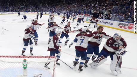 Colorado Avalanche players celebrate after defeating the Tampa Bay Lightning in game six of the Stanley Cup Finals.