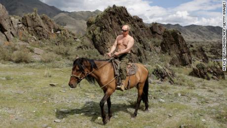Russian Prime Minister Vladimir Putin rides a horse during his vacation in Siberia, 2009. 
