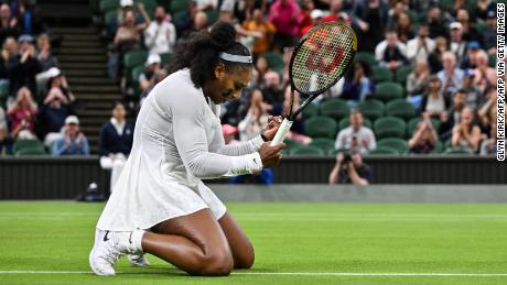 Williams fist pumps during her first-round defeat against Harmony Tan at Wimbledon. 