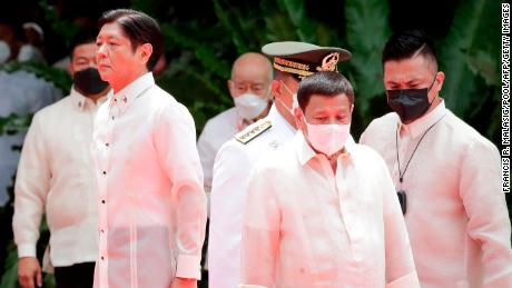 Incoming President of the Philippines Ferdinand Marcos Jr.  and outgoing President Rodrigo Duterte attend the inauguration ceremony for Marcos on the grounds of the Malacañang presidential palace in Manila on June 30.