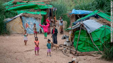 Karen refugees fleeing fighting between the Myanmar army and rebel groups in a makeshift camp on the Myanmar side of the Moei River, which forms the border with Thailand.