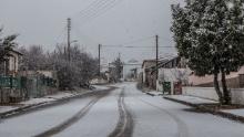 A general view of the village of Akrini covered by the snow during winter.