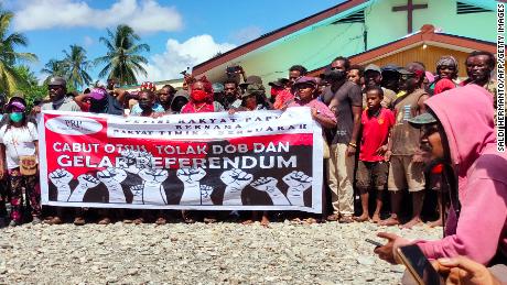 Protesters hold a demonstration against the Indonesian government&#39;s plan to form a new autonomous region, in Timika, Papua, on June 3.