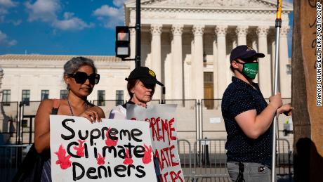 Climate activists protest outside the U.S. Supreme Court after the court announced its decision in West Virginia v. EPA June 30, 2022. (Francis Chung/E&amp;E News/POLITICO via AP Images)