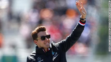 MONTREAL, QUEBEC - JUNE 19: George Russell of Great Britain and Mercedes waves to the crowd on the drivers parade ahead of the F1 Grand Prix of Canada at Circuit Gilles Villeneuve on June 19, 2022 in Montreal, Quebec. (Photo by Clive Rose/Getty Images)
