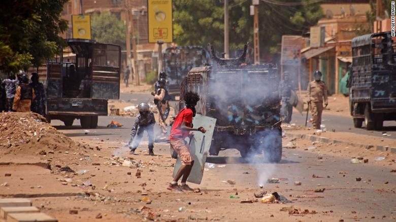 A Sudanese anti-coup protester clashes with security forces during a demonstration against military rule, in Khartoum on June 30, 2022. 