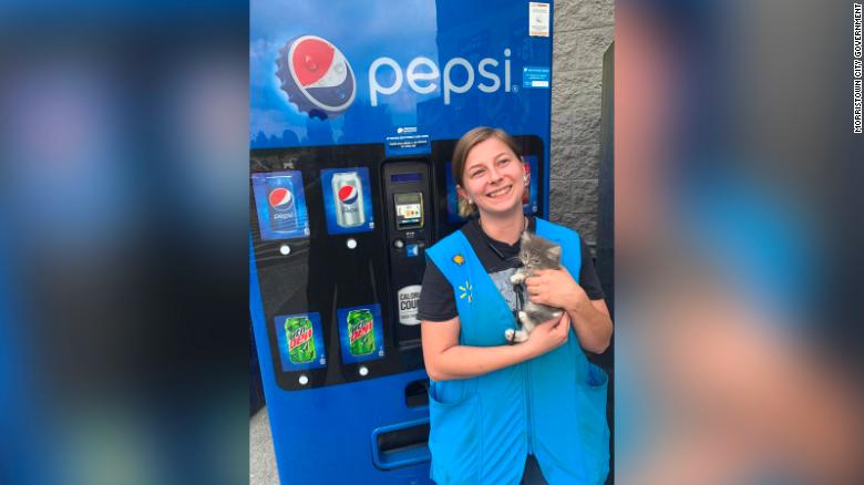 Firefighters came to the rescue of a kitten trapped in a Walmart Pepsi machine