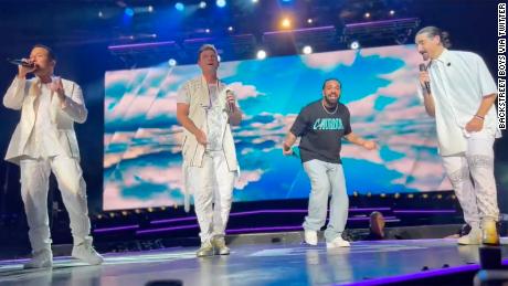 (L to R) Howie Dorough, Nick Carter, special guest Drake and Kevin Richardson perform at a Backstreet Boys concert in Toronto for the band's DNA World Tour. 
