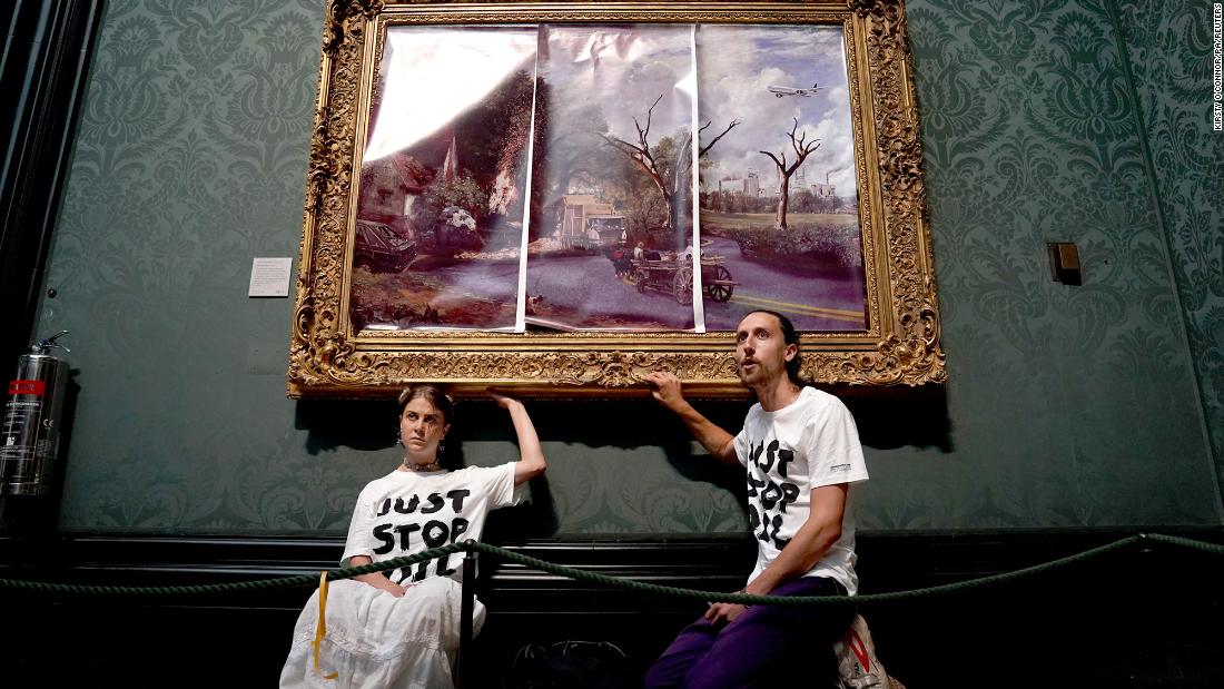 ‘Just stop oil’ climate protesters stick to ‘The Hay Wain’ at London’s National Gallery