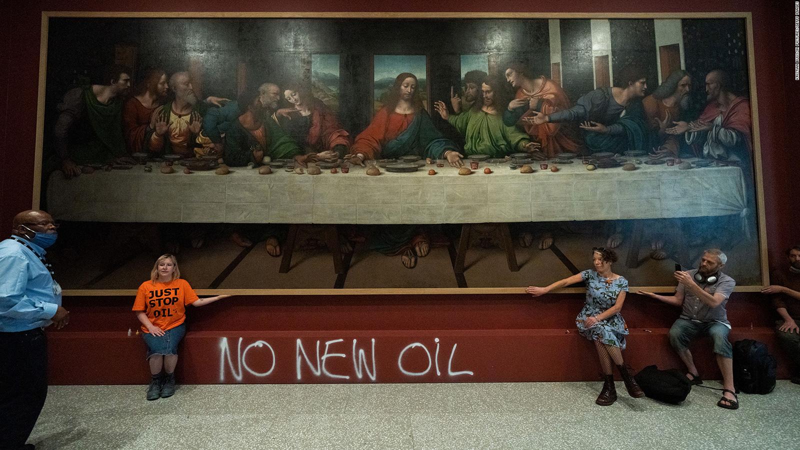 Activists glue themselves to copy of Leonardo's 'The Last Supper,' adding  to string of similar protests - CNN Style
