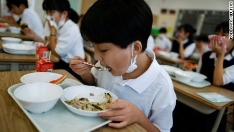 A student eats lunch at Senju Aoba Junior High School in Tokyo, Japan, on June 29.