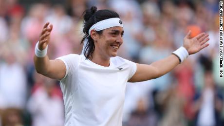 Ons Jabeur celebrates making history after beating Marie Bouzková in their women&#39;s quarterfinal at Wimbledon.