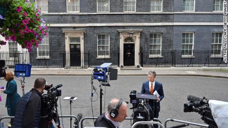 Journalists gather outside 10 Downing Street on July 7, 2022.