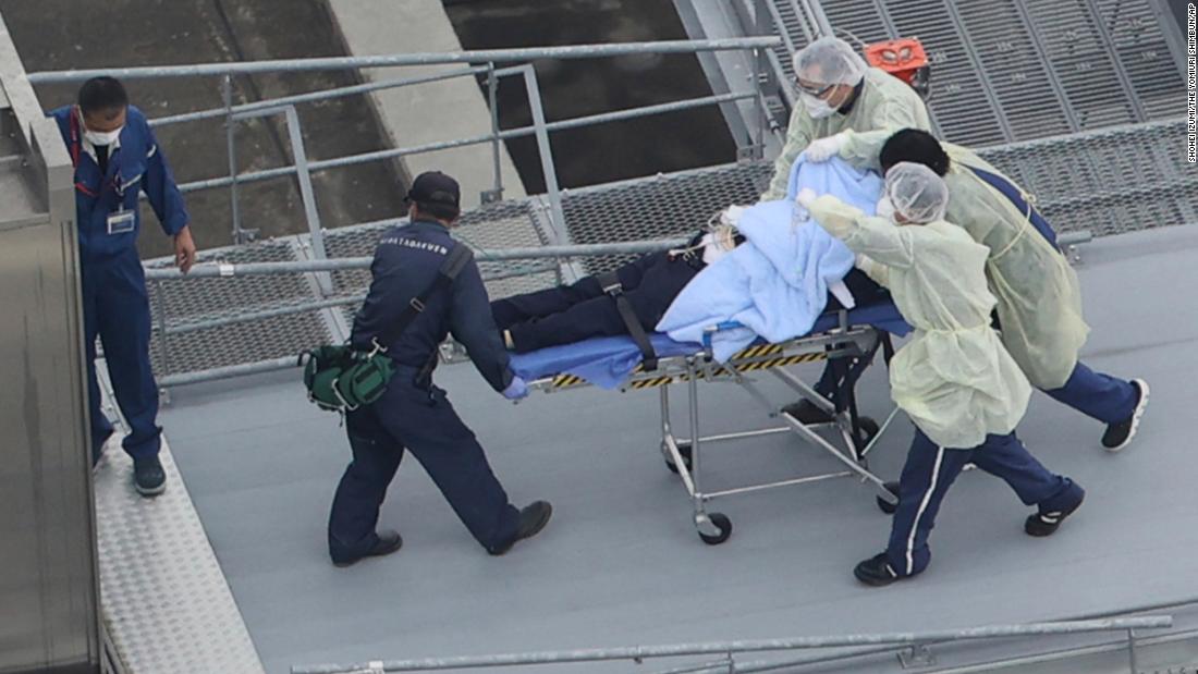 This aerial photo shows a man believed to be Abe on a stretcher at a hospital in Kashihara on Friday.
