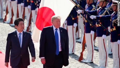 Abe then escorts President Donald Trump during a welcome ceremony at Akasaka Palace on November 6, 2017.