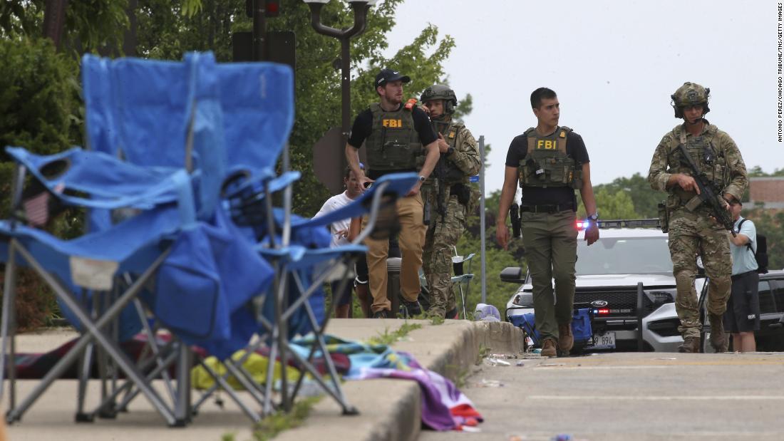 Highland Park shooter's rooftop position made it difficult for officers to find him quickly as parade turned into chaos, police chief says