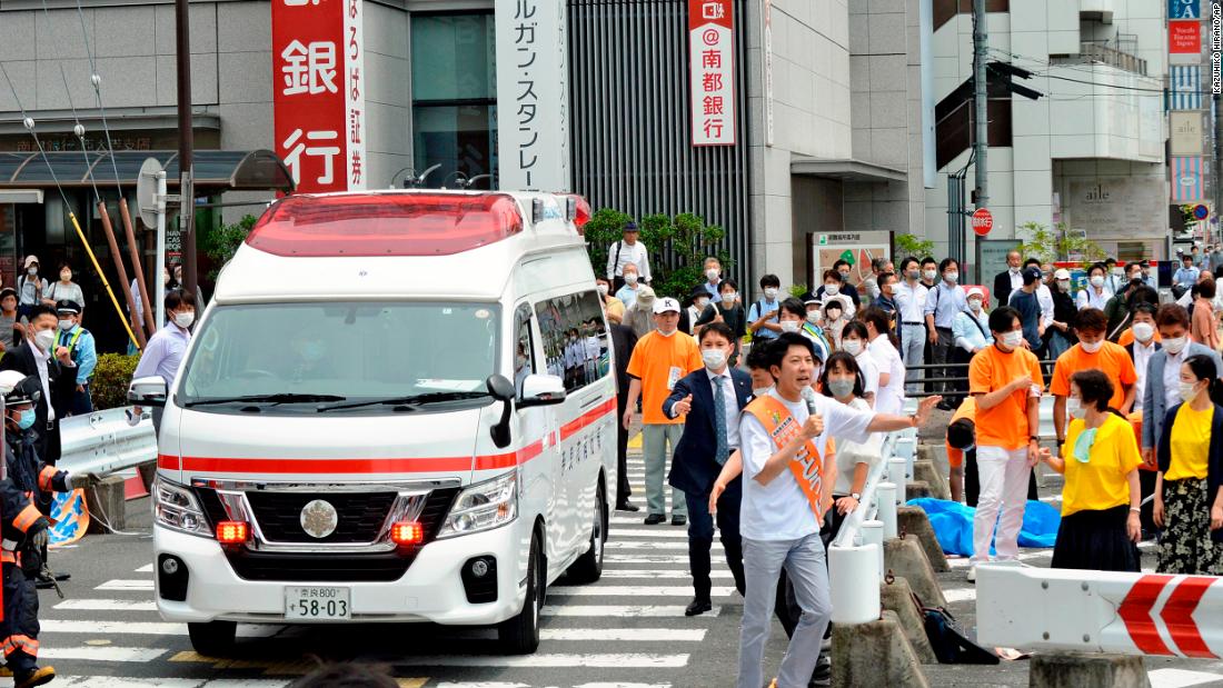 An ambulance carries Abe from the shooting site in Nara.