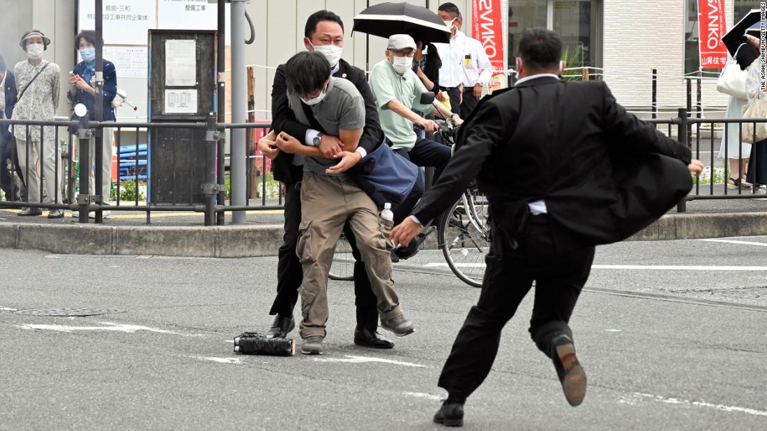 Police tackle &lt;a href=&quot;https://www.cnn.com/2022/07/09/asia/shinzo-abe-tetsuya-yamagami-explainer-intl-hnk/index.html&quot; target=&quot;_blank&quot;&gt;suspect Tetsuya Yamagami&lt;/a&gt;  on Friday.